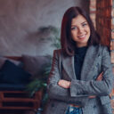 Portrait of a charming brunette in a room with loft interior.